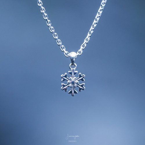 Sterling silver snowflake necklace with delicate pendant