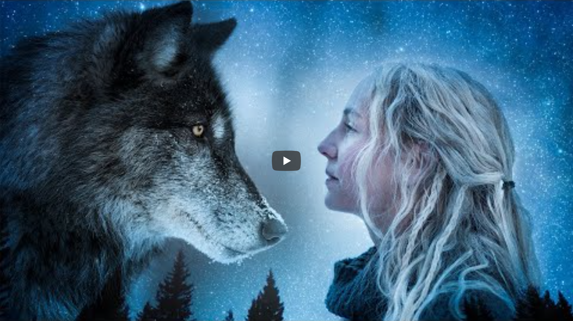 A close up of a girl looking at a wolf