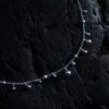 Skir Necklace, a sterling silver bead necklace with polished silver beads in varying sizes on a delicate 925 sterling silver chain.