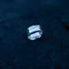 Handcrafted sterling silver water ring with flowing organic curves inspired by waves.