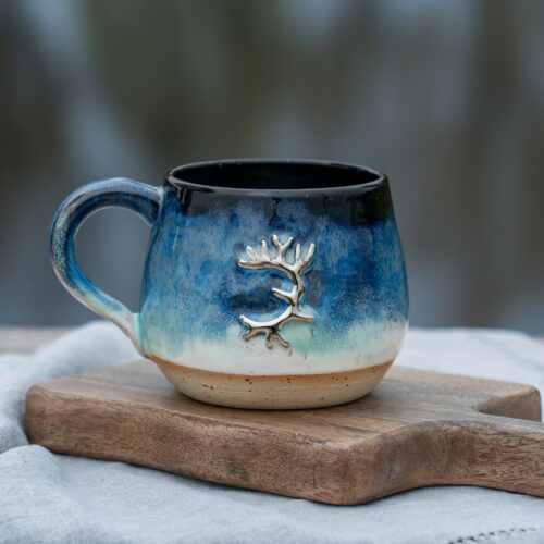 Handmade ceramic mug, "Wild" by Jonna Jinton, featuring an